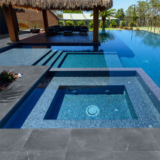 Pietra Grey Sagittarius Porcelain Tiles by pool